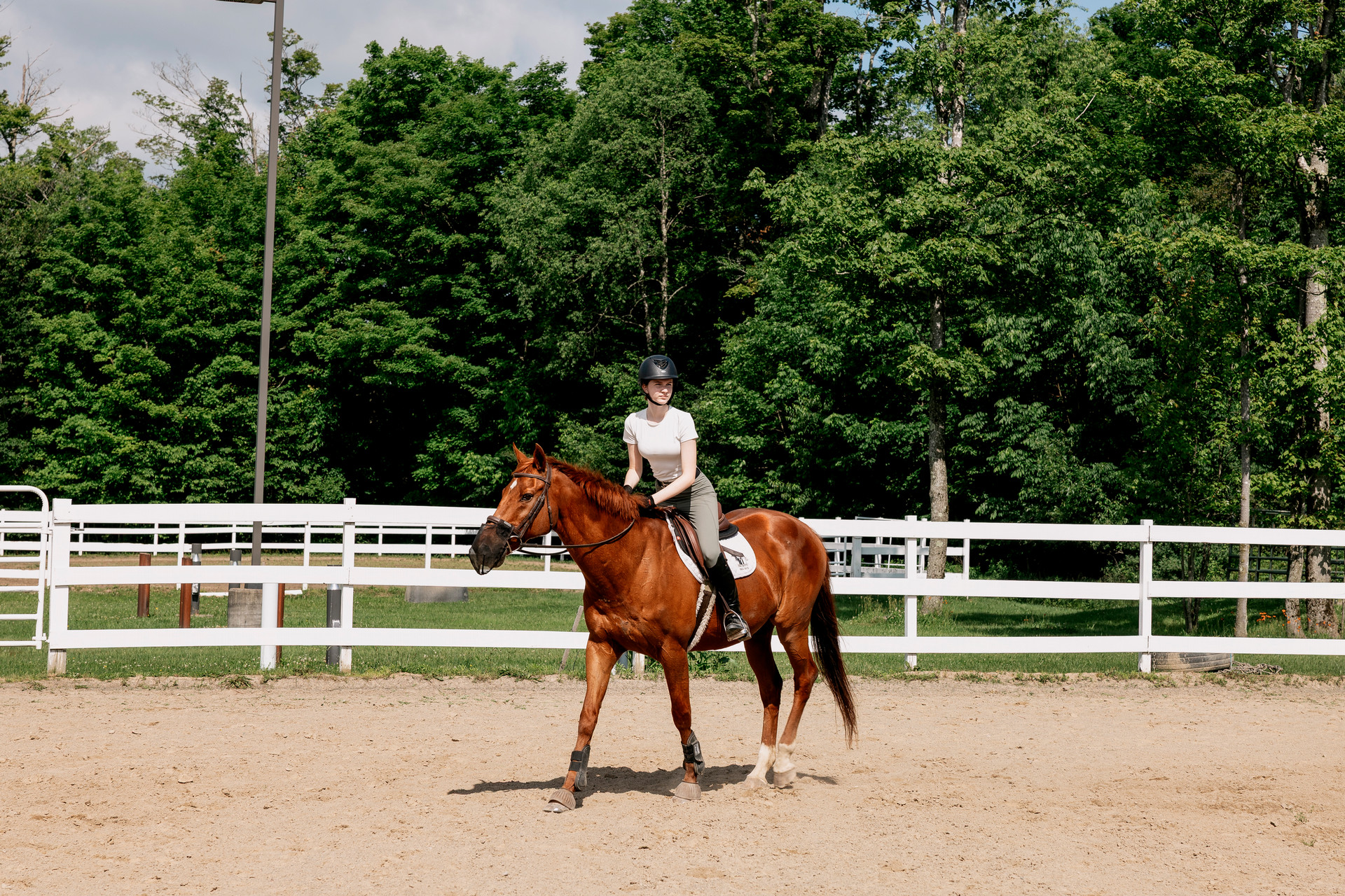 A student riding a horse