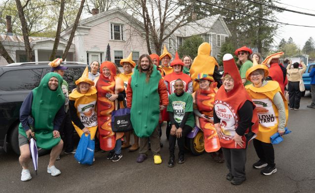 A group photo of people wearing costumes during Hot Dog Day