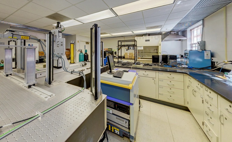 glass lab with various equipment and stations