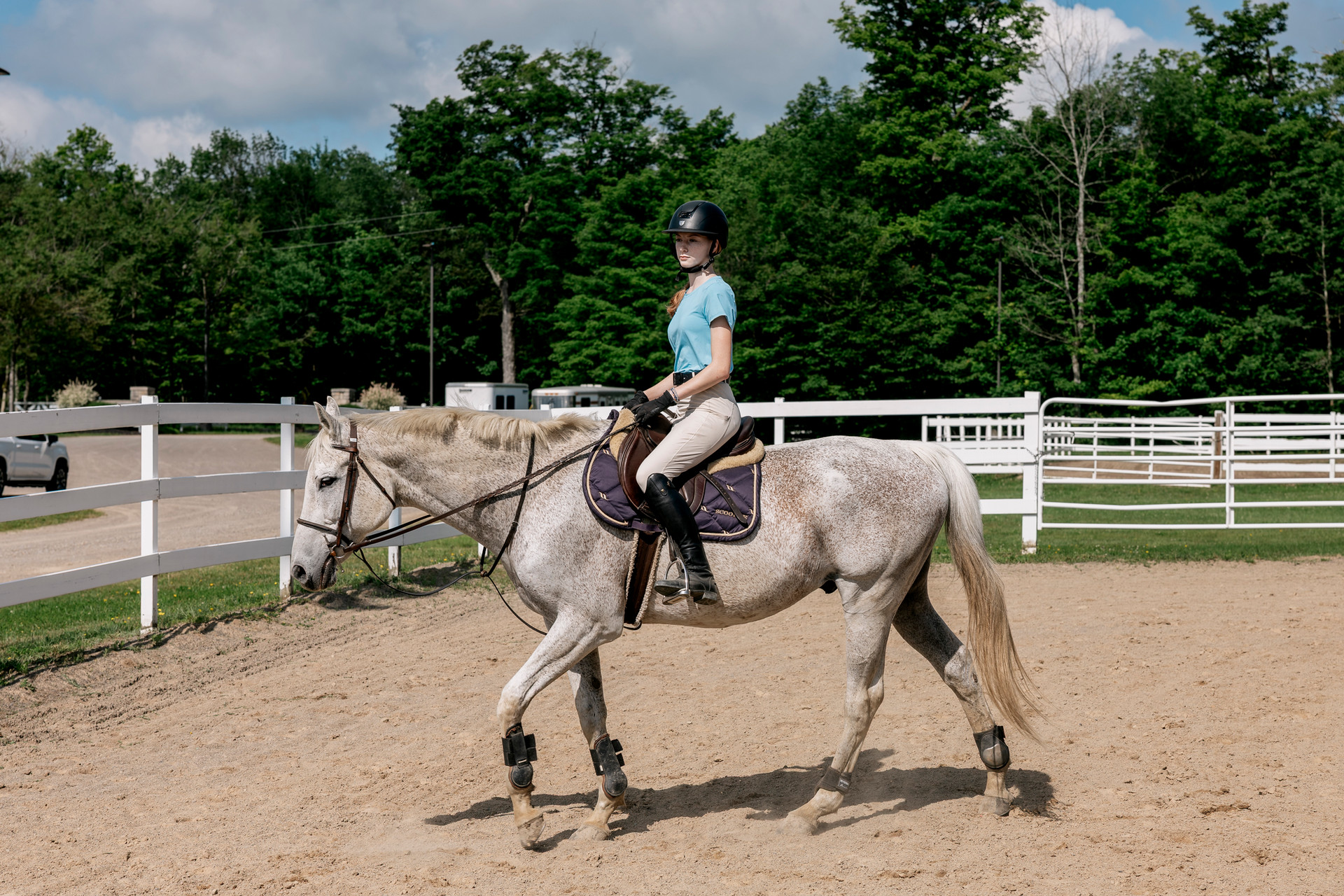 A student riding a horse