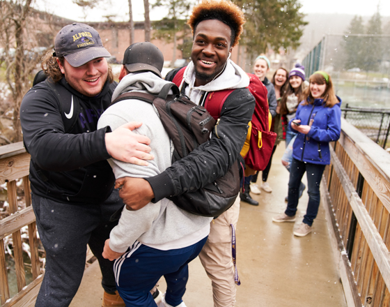 Students out by Merrill Field. 