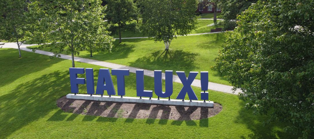 A photo of the Fiat Lux sign at Alfred University