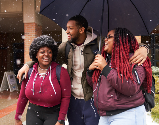 Three students walking around town