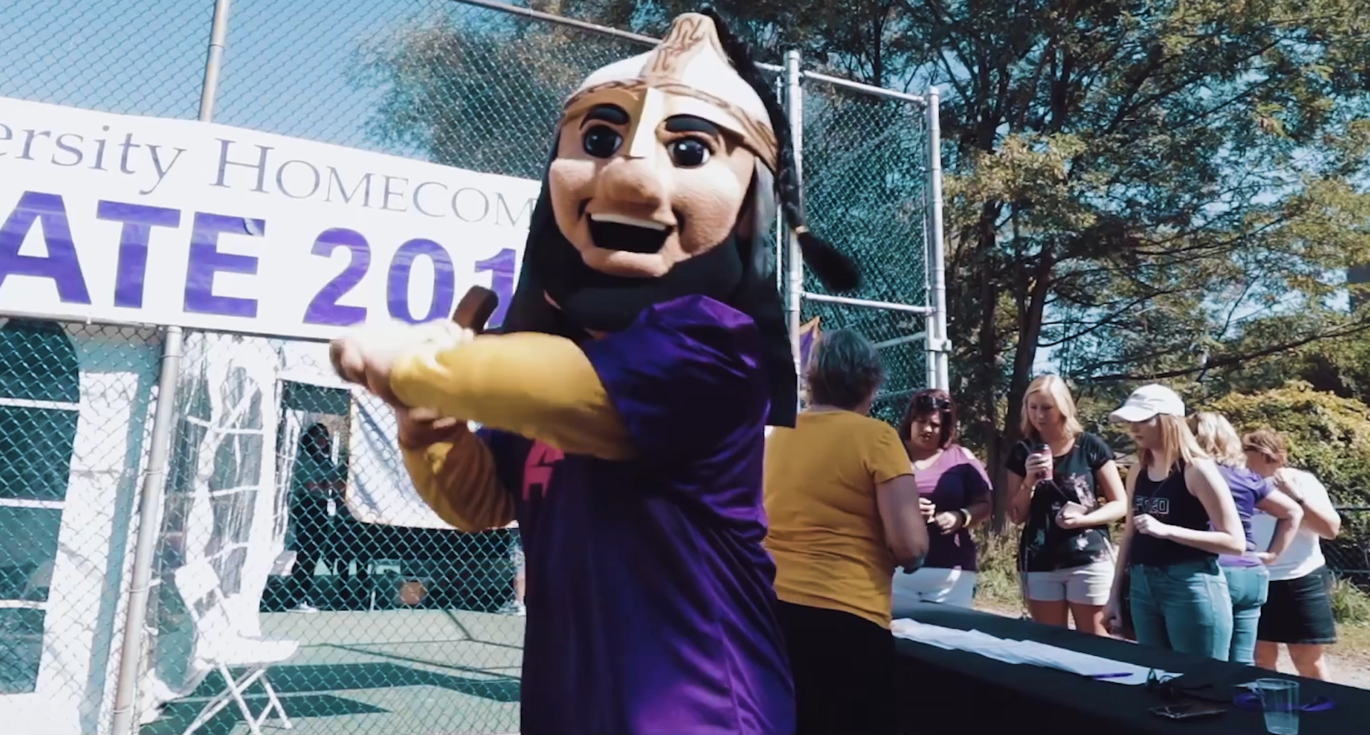 Saxon mascot swinging a bat