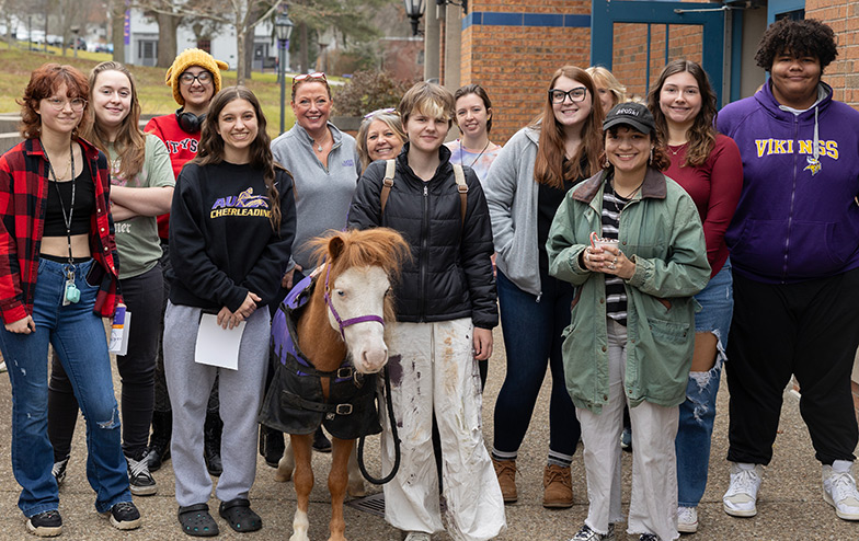 Alfred campus building with text, Those golden Days; Students with text, #AUPride