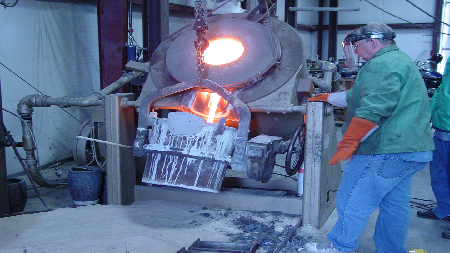 A photo of a person restoring the Carillon bells