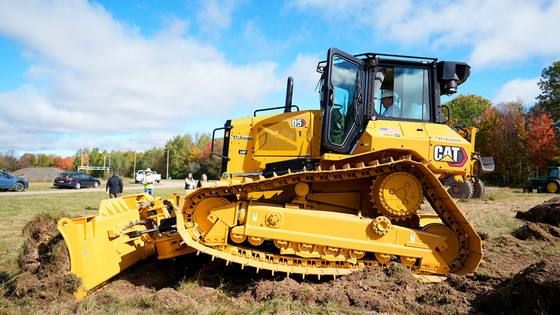 A bulldozer breaking ground