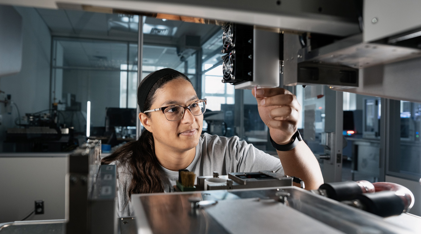 Student using a bioplotter machine
