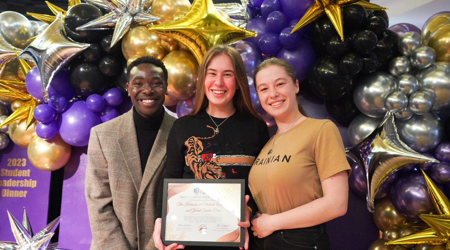 students accepting an award