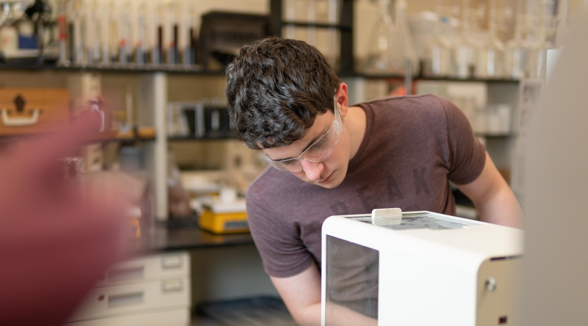 student learning about ceramics