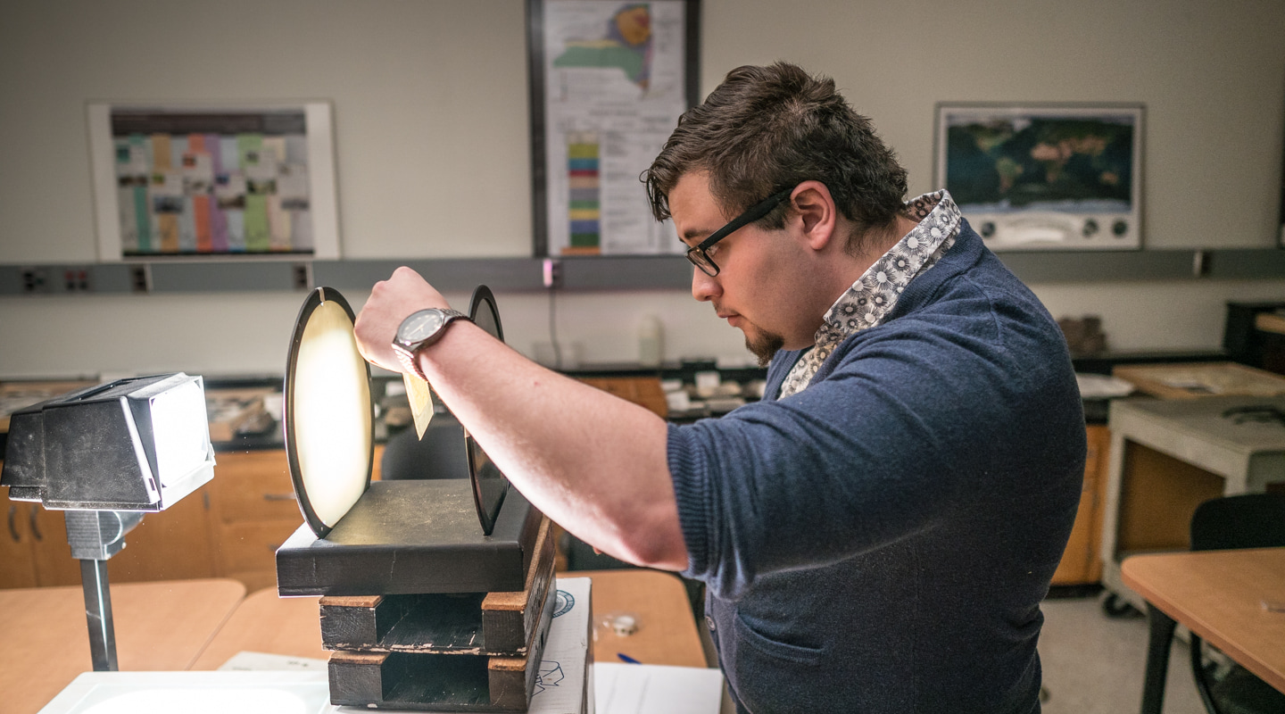 student examining information