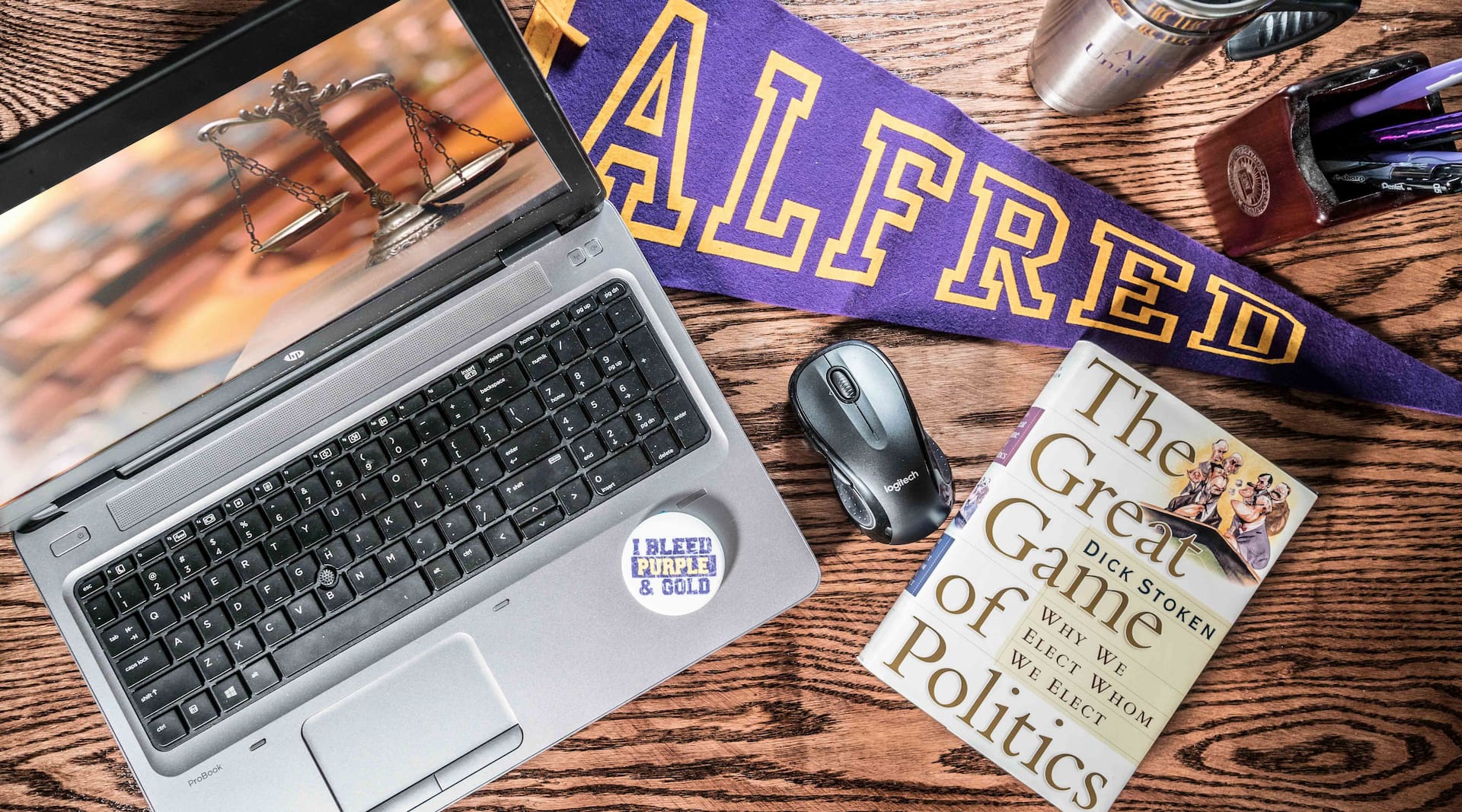 laptop with items around it on desk
