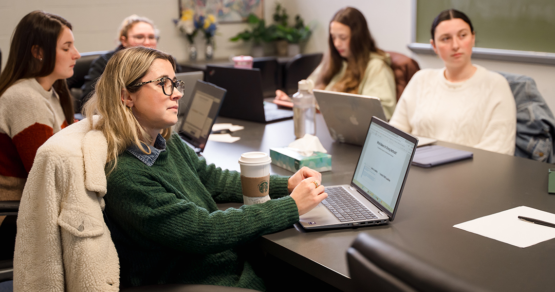 A photo of Alfred University psychology students learning psychology in a classroom