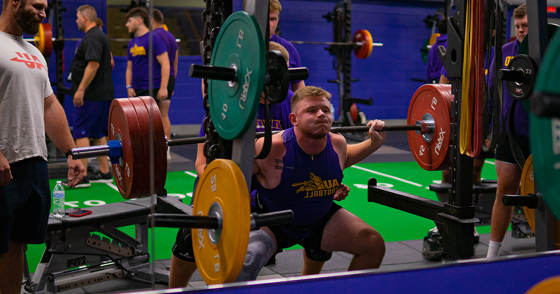 A photo of Alfred University students working out in a gym