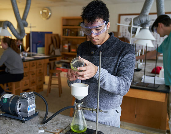 Male student in a biology lab