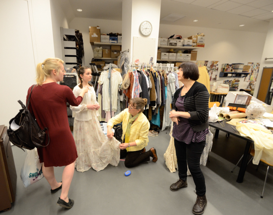 people preparing costume