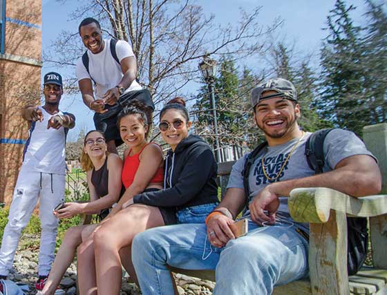 students in a group outside of the Powell Campus Center