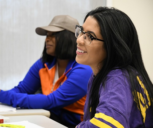 students in class smiling