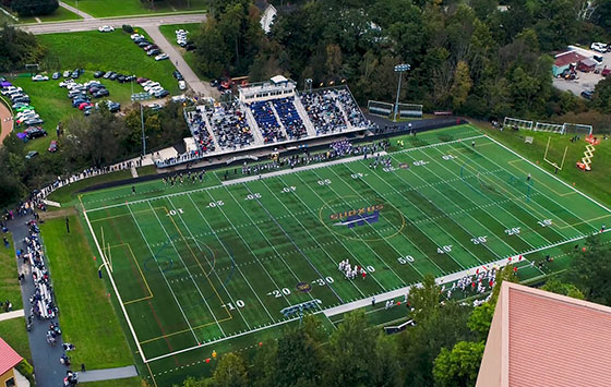 Aerial view of athletic field during Homecoming