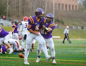 Two football players at a game