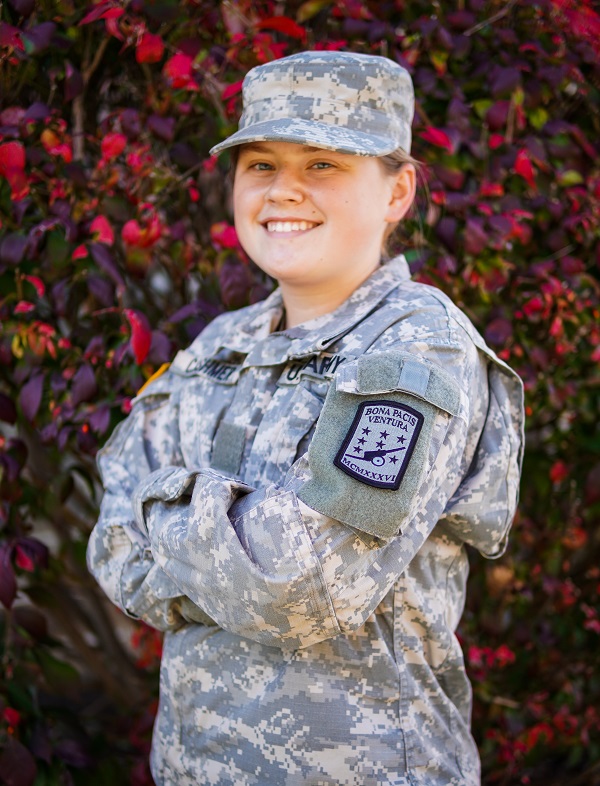Makenzie Cashmer in uniform smiling