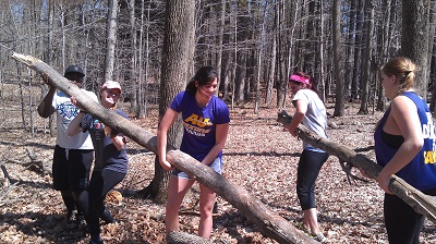 Students cleaning up local state forest trails