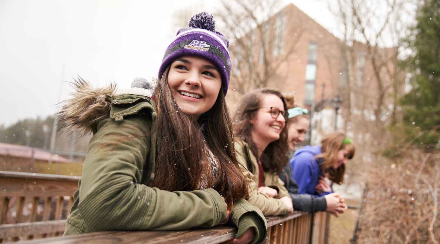 Students looking over bridge