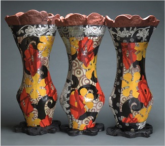 willard pottery, colorful in shades of red, yellow, black and brown