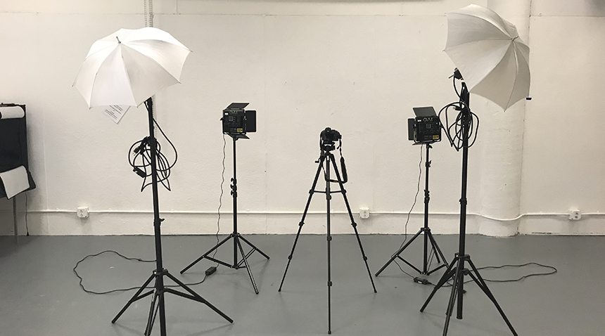 photo and lighting equipment in an empty room