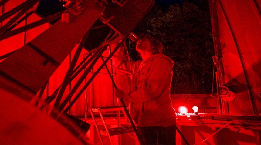 campers looking through our high powered telescope in our observatory
