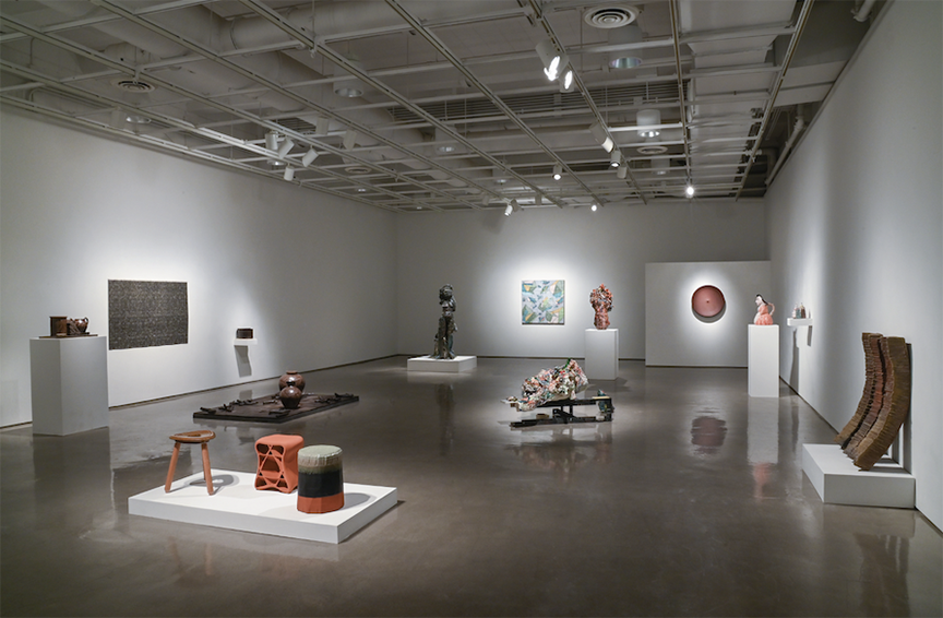 image of a large gallery filled with ceramic art by 13 artists