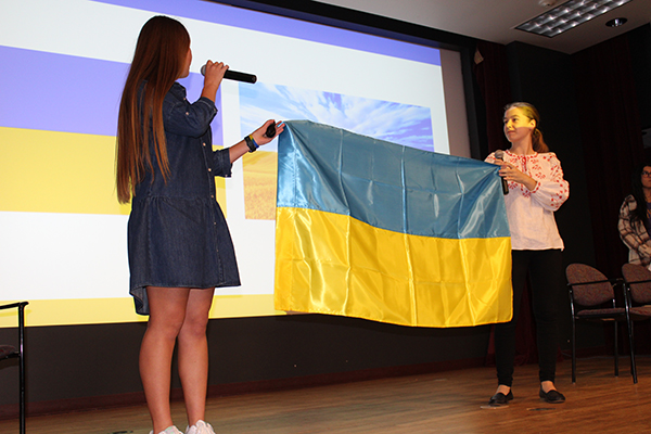 Ukrainian students holding national flag