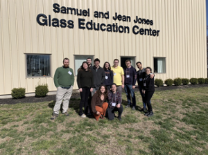 Alfred students group picture standing outside of the Samuel and Jean Jones Glass Education Center at Salem Community College, at the 2023 International Flameworking Conference.