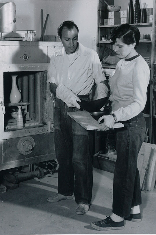 man and woman at a kiln
