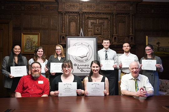 group photo of students with certificates