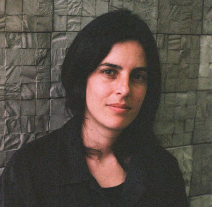 headshot of woman with long dark hair