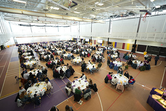 several people sitting at tables for lunch