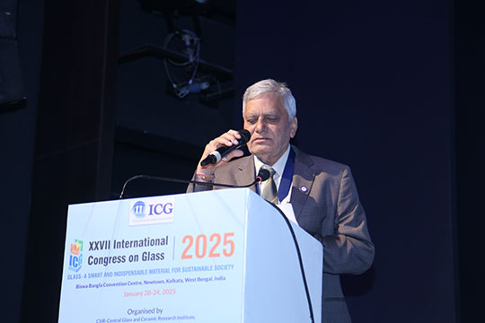 man speaking at podium