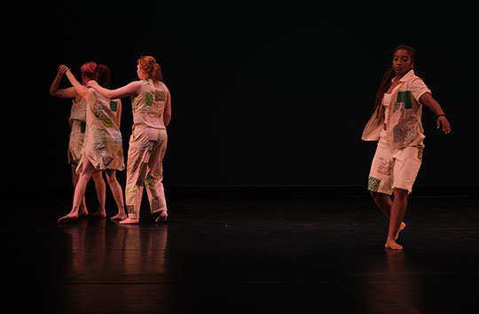 people on stage dancing