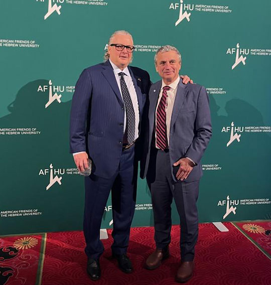 two men in suits and ties