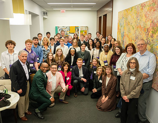 group of people smiling for camera