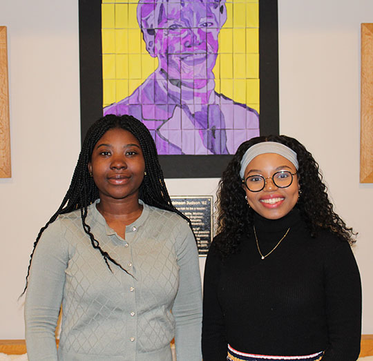 two women standing next to each other