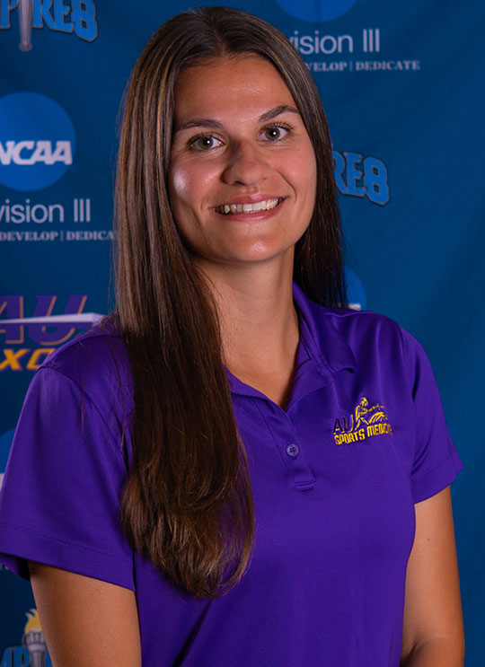 headshot of young woman, smiling