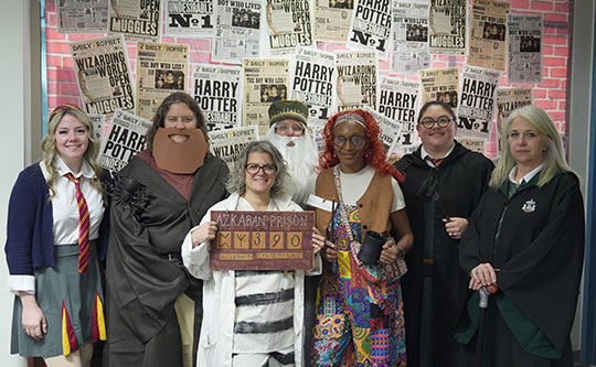 group of people dressed up in Harry Potter themed costumes