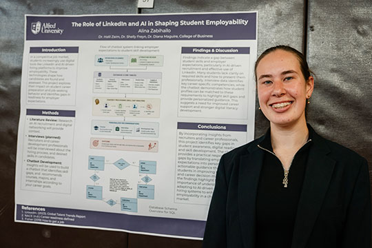 woman standing in front of a poster