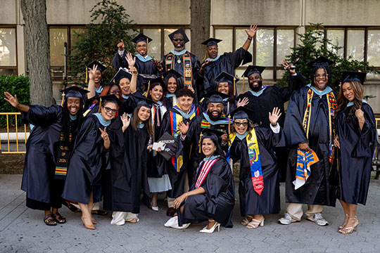 group of graduaes in cap and gown