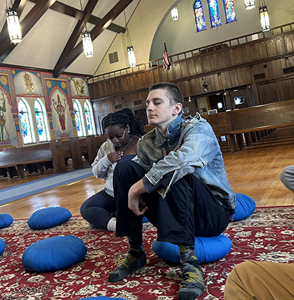 Image of student meditating at Hindu Temple near Elmira