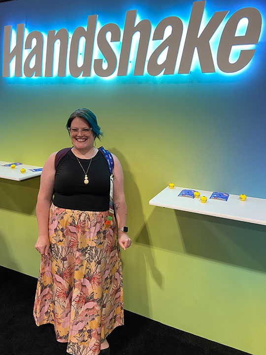 woman standing in front of a display