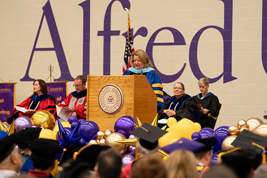 Kim Harvey speaking at opening convocation