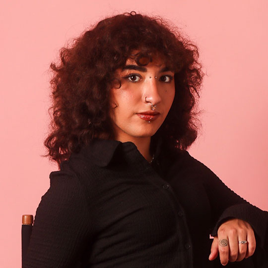 headshot of person with long hair